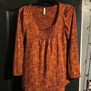 Fall colored long sleeved shirt with flowers  medium size